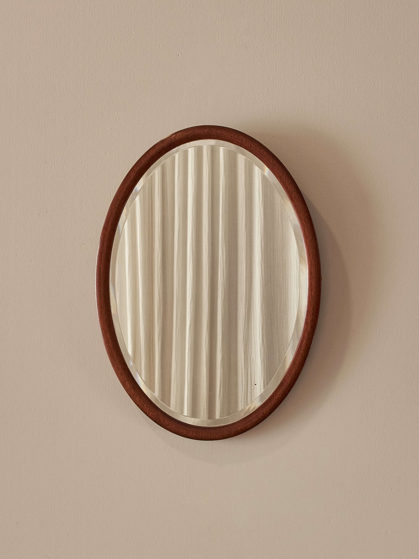 Victorian mahogany oval mirror