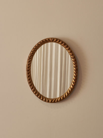 Vintage oval gesso rope-twist mirror