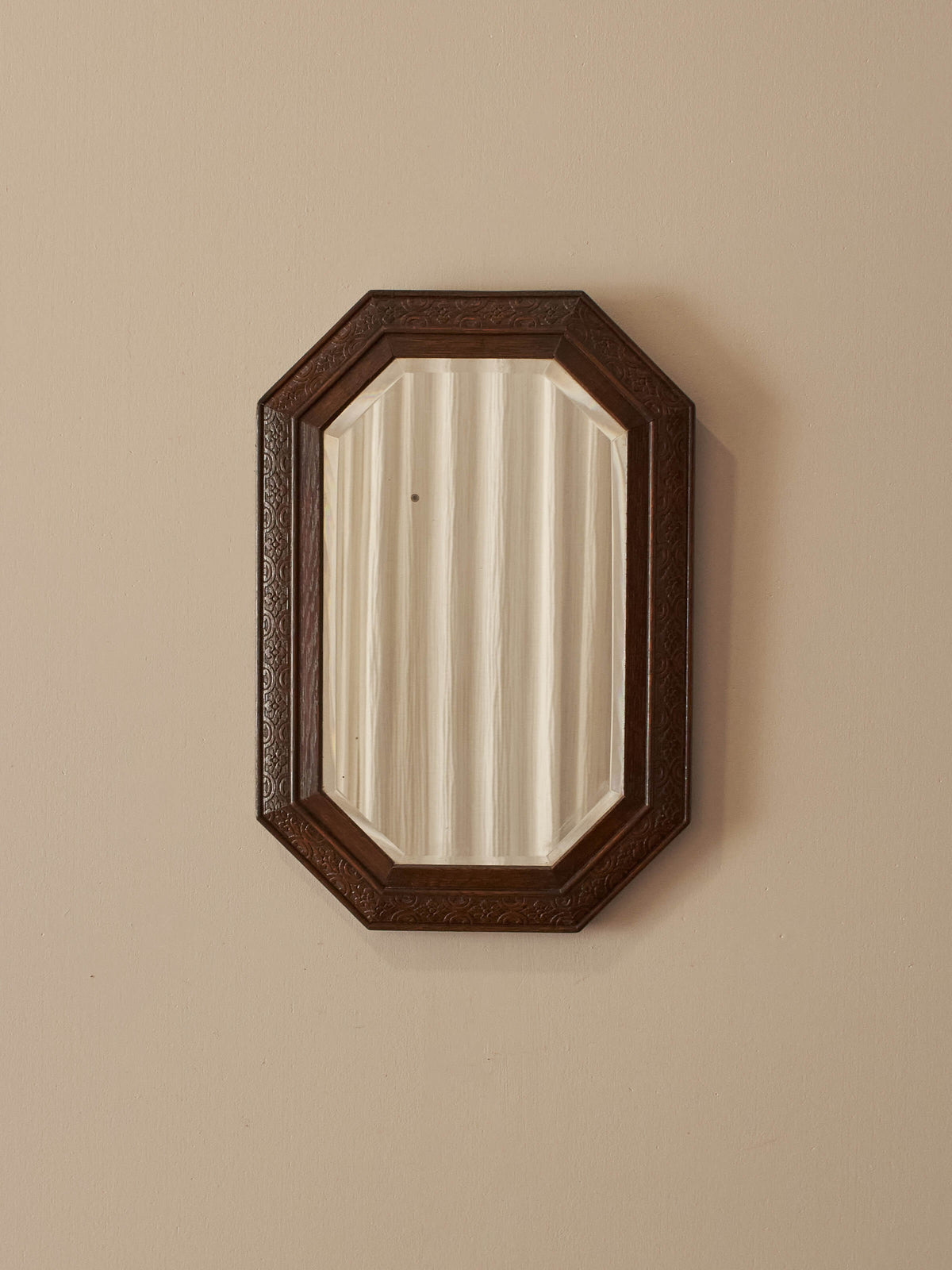 Edwardian oak carved octagonal mirror