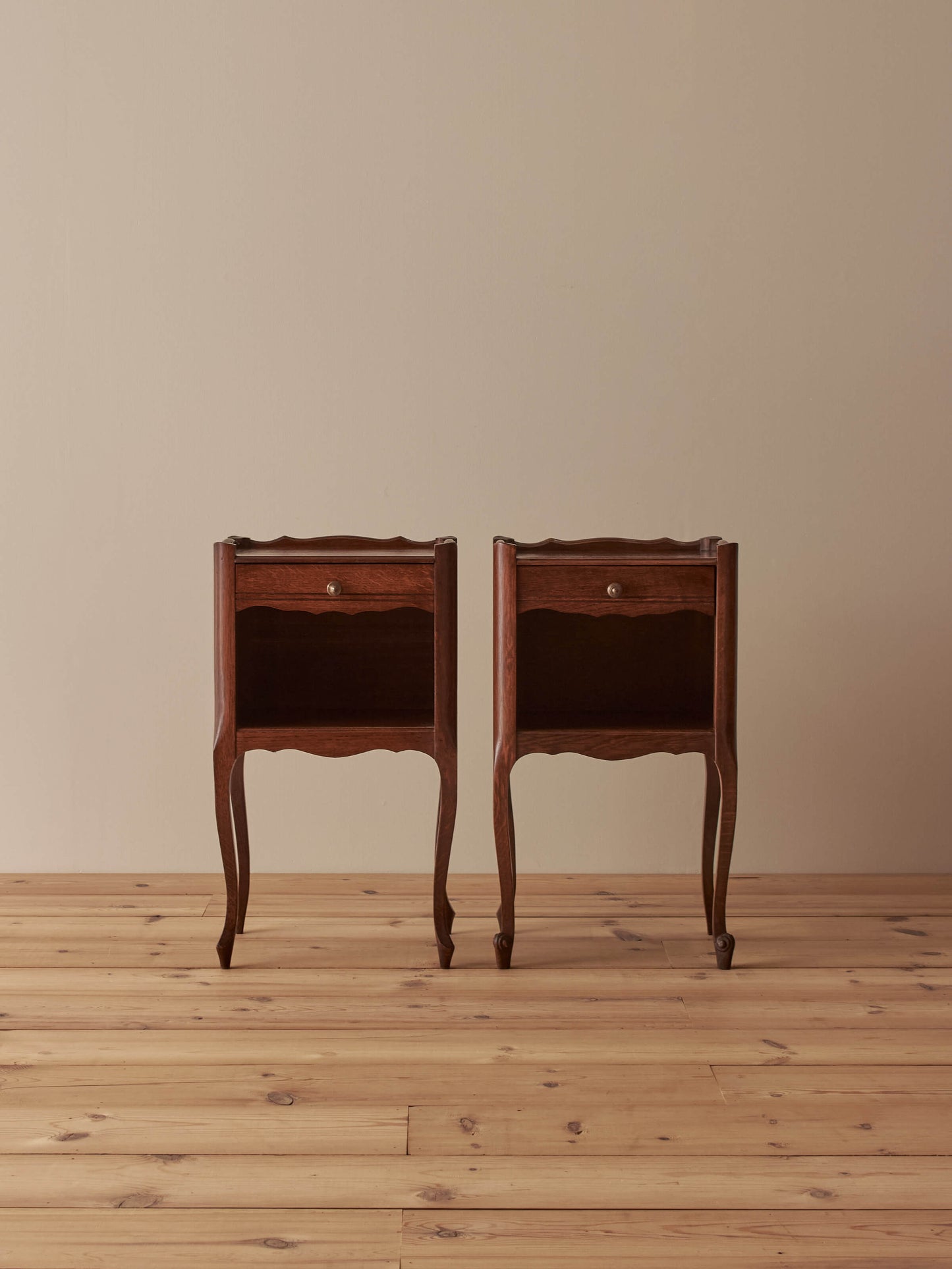 Close-pair of French oak bedside tables