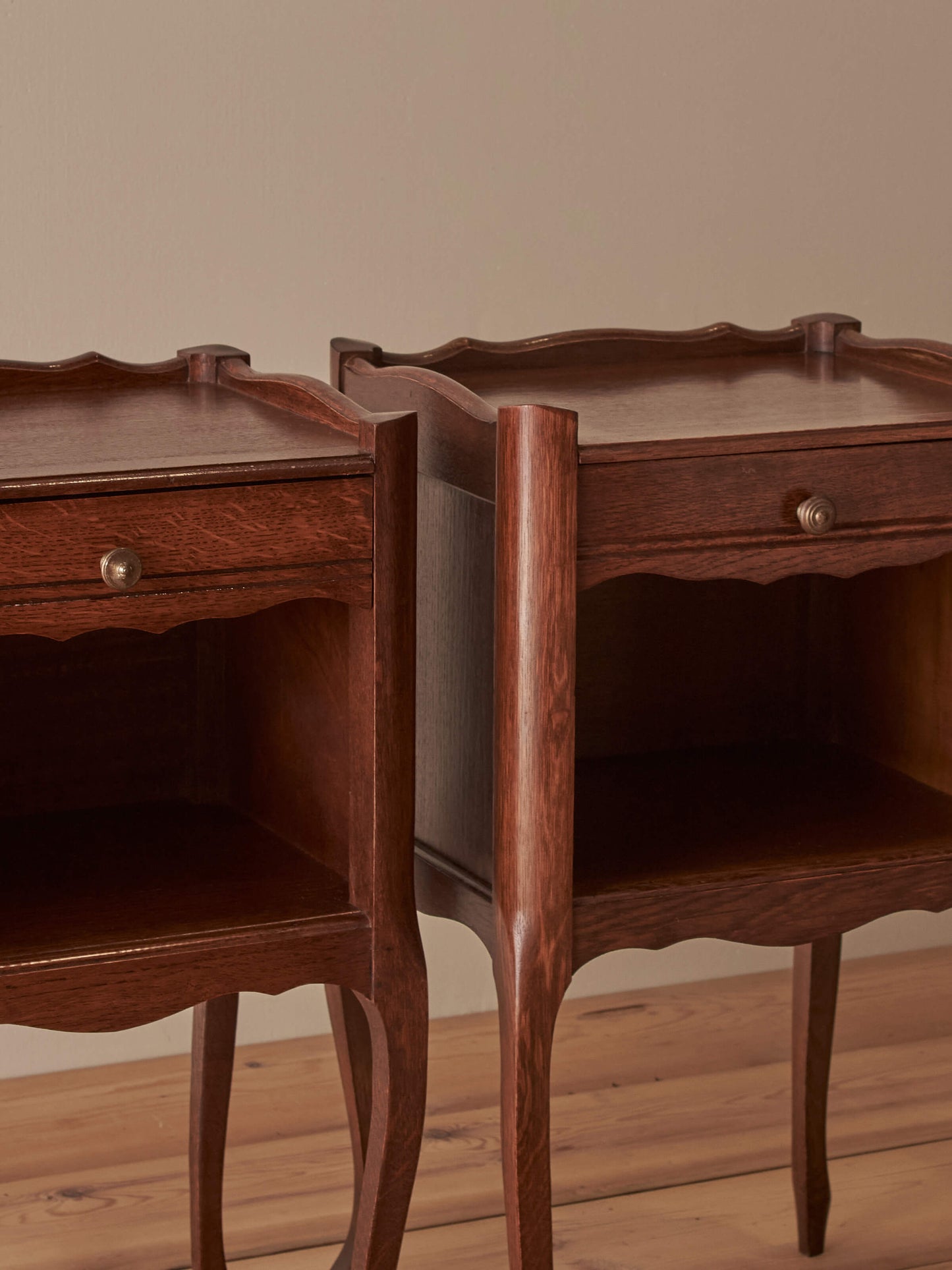 Close-pair of French oak bedside tables