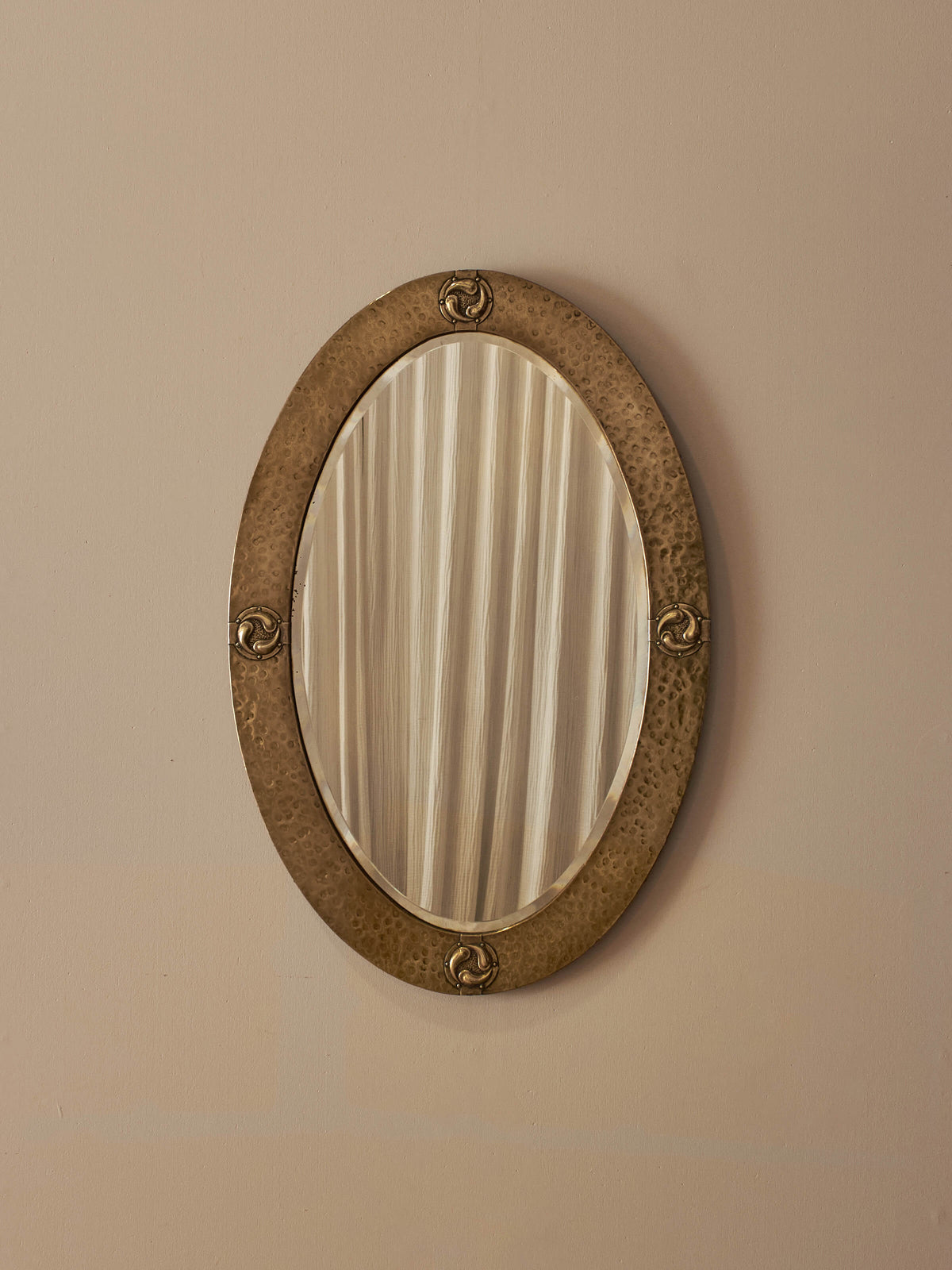 Antique brass Arts and Crafts decorative mirror