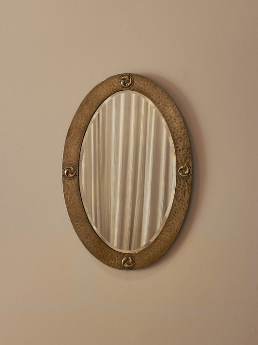 Antique brass Arts and Crafts decorative mirror