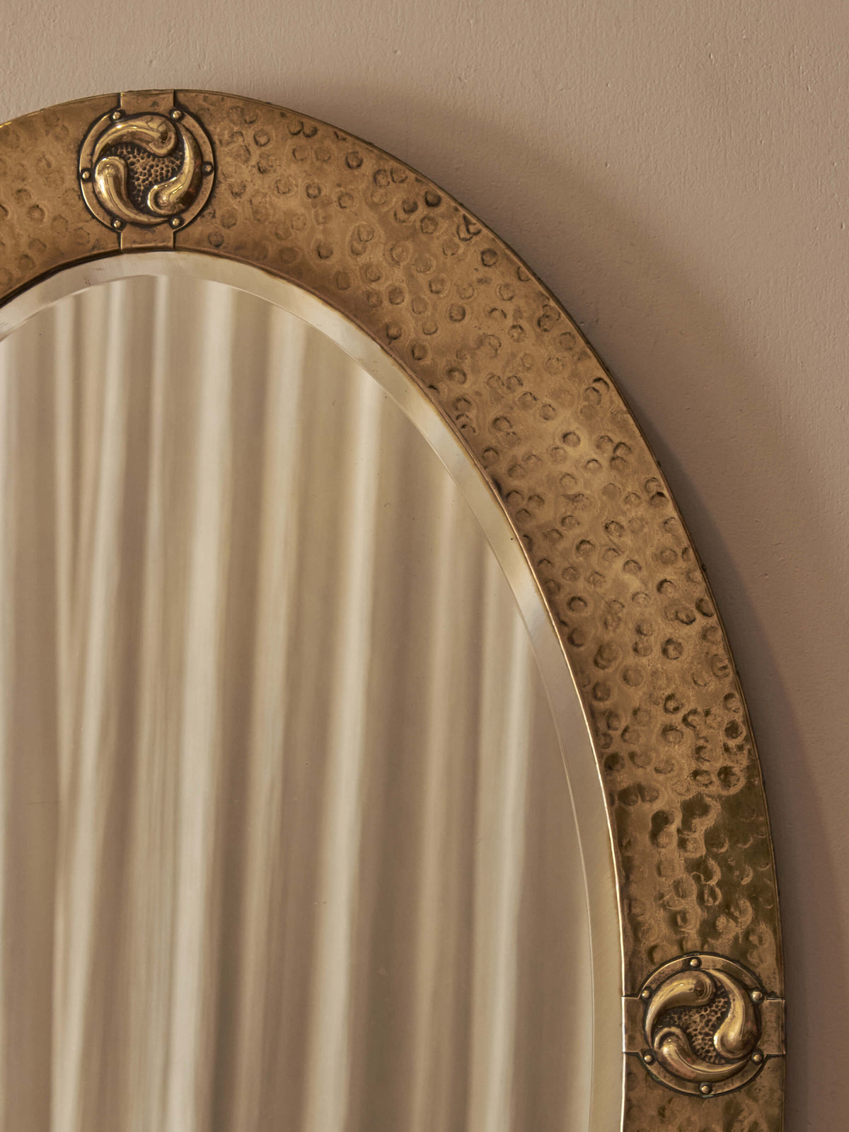 Antique brass Arts and Crafts decorative mirror