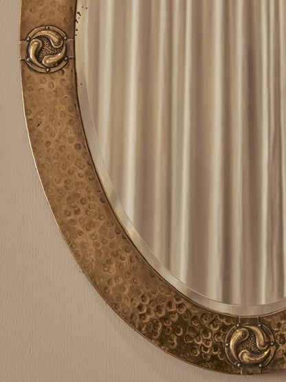 Antique brass Arts and Crafts decorative mirror