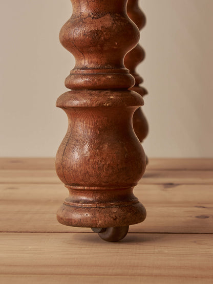 Victorian oak bobbin desk on castors