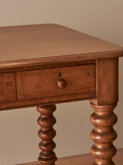 Victorian oak bobbin desk on castors