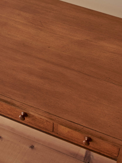 Victorian oak bobbin desk on castors