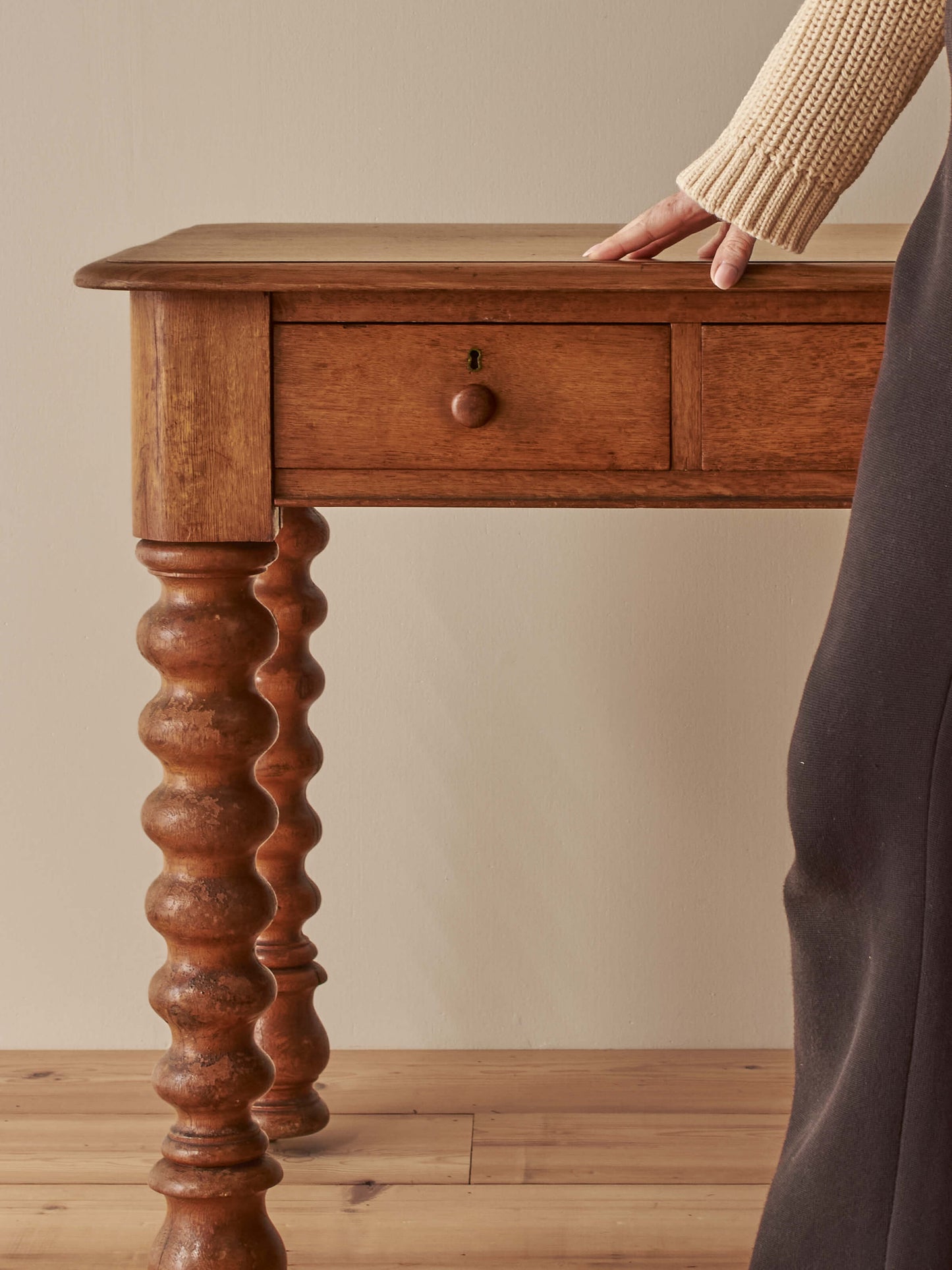 Victorian oak bobbin desk on castors