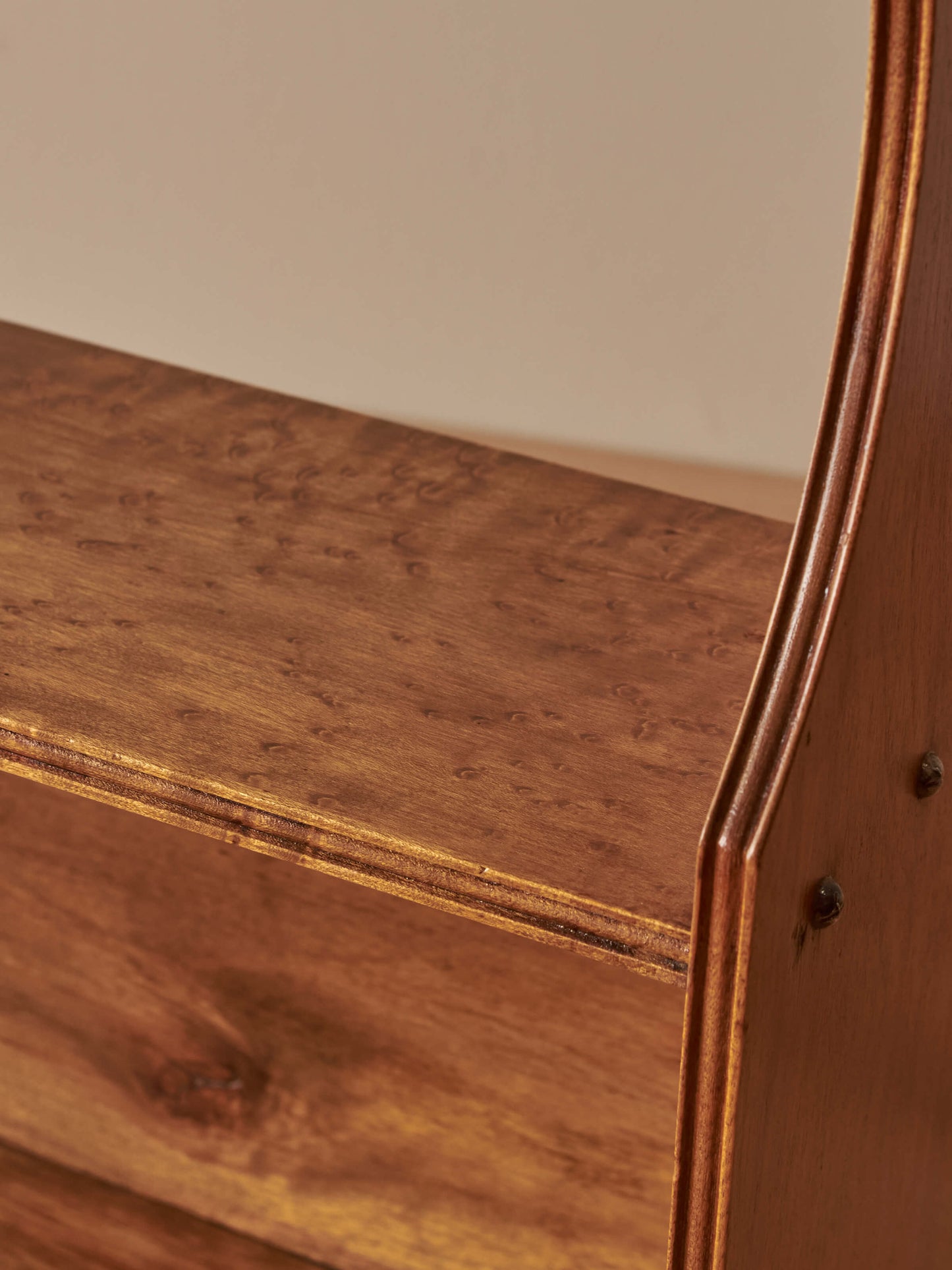 Mid-century walnut and birds-eye maple wall shelf