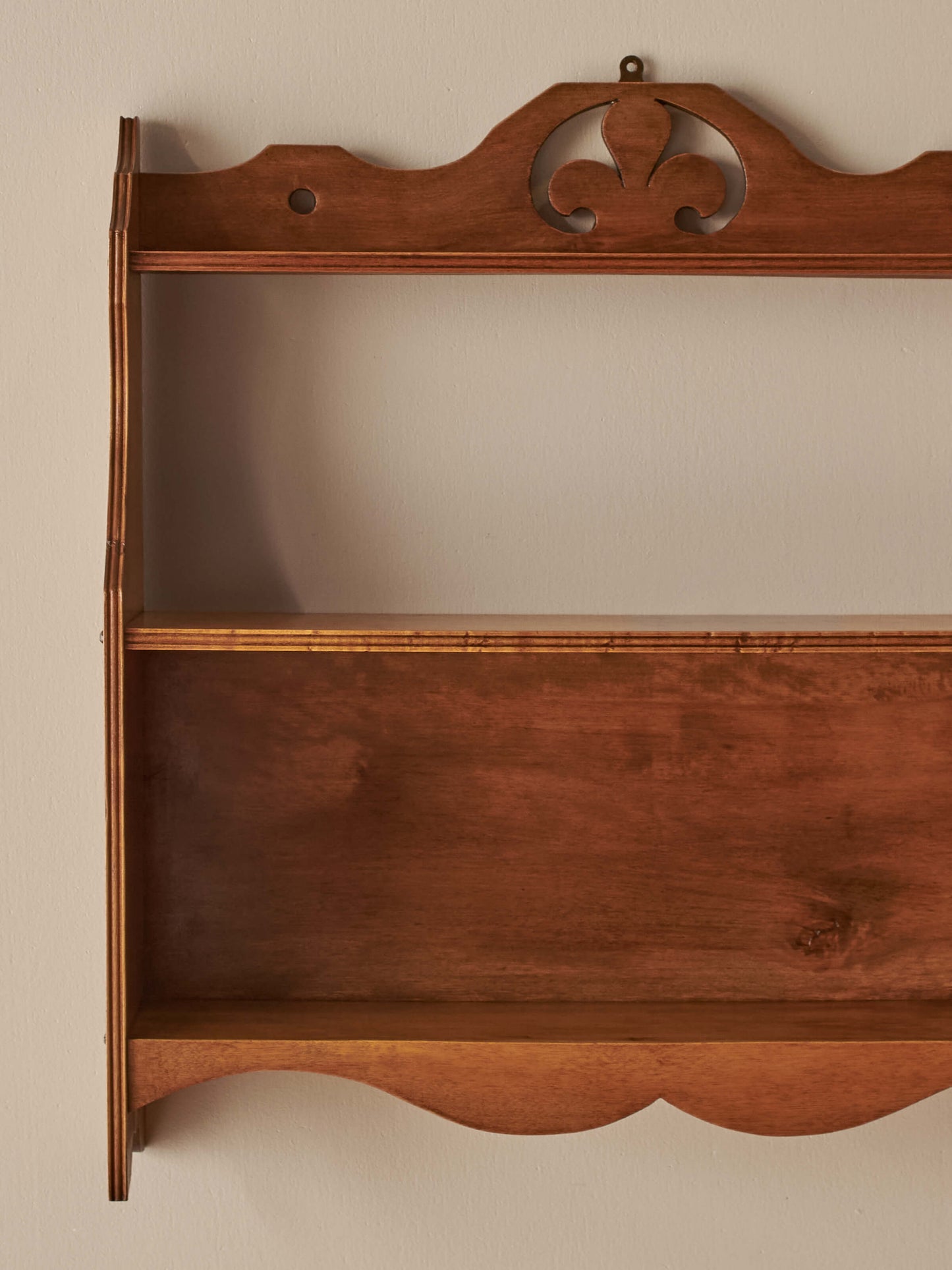 Mid-century walnut and birds-eye maple wall shelf