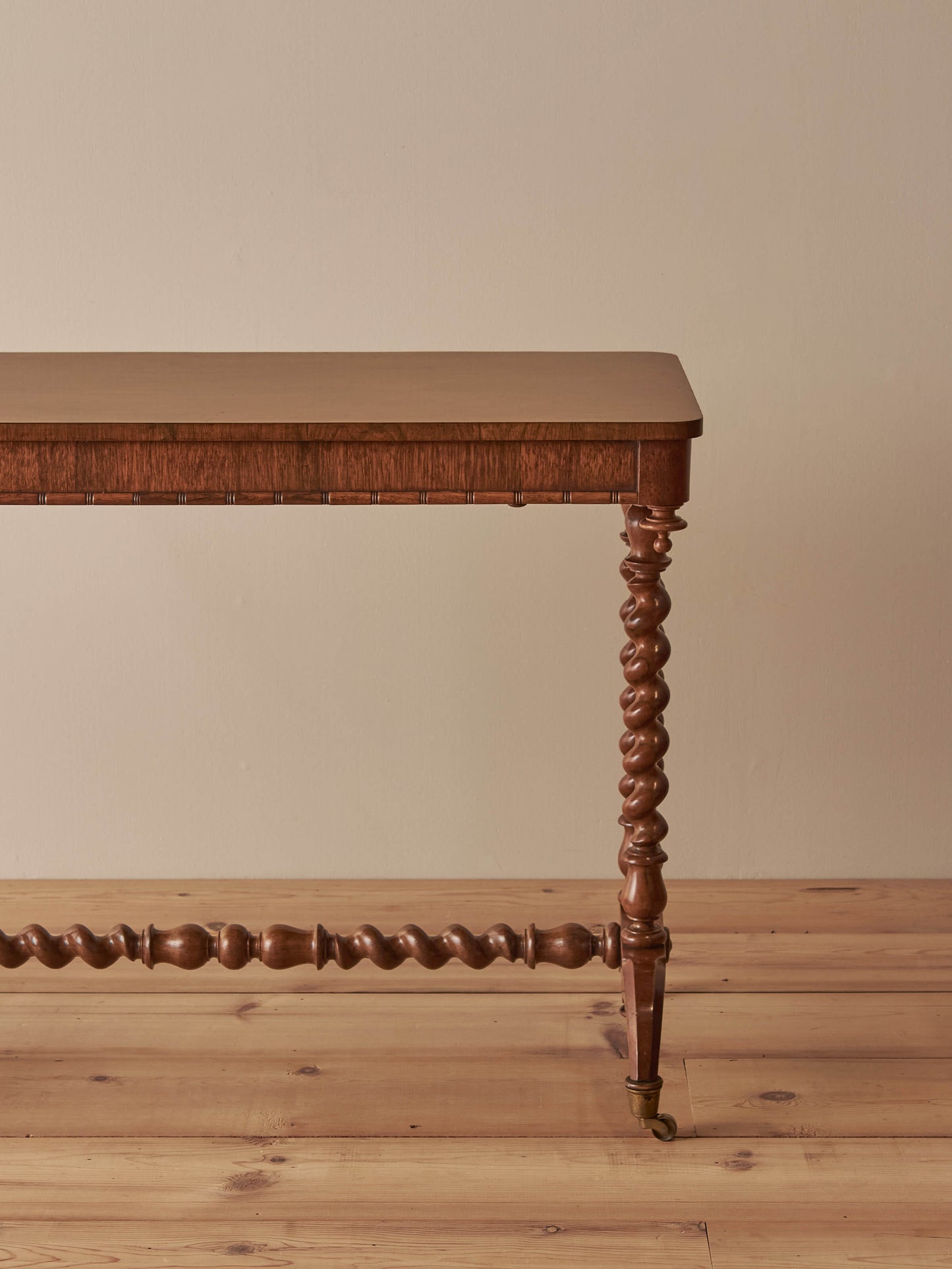Victorian rosewood console table on brass castors