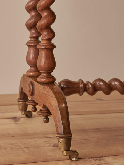 Victorian rosewood console table on brass castors