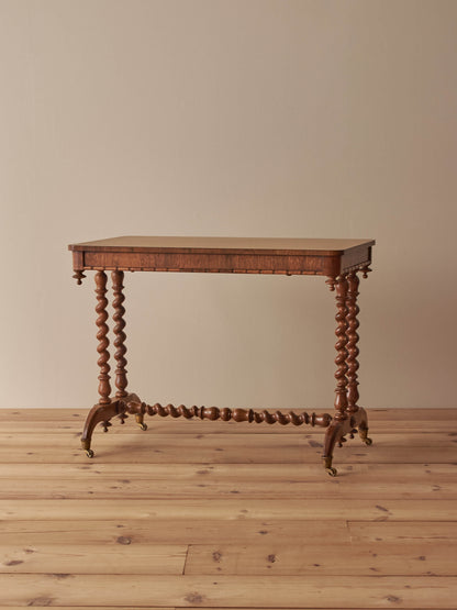 Victorian rosewood console table on brass castors