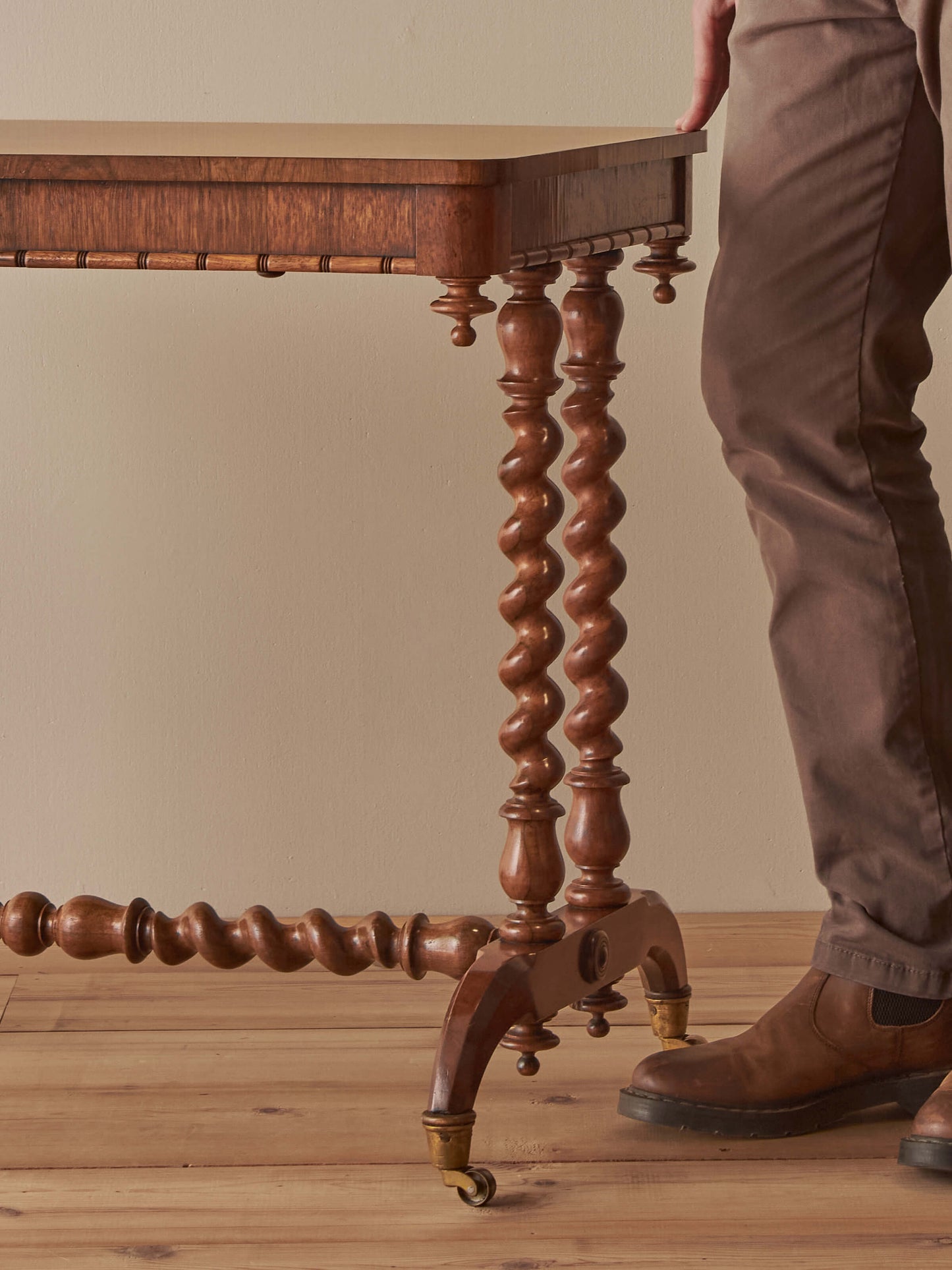 Victorian rosewood console table on brass castors