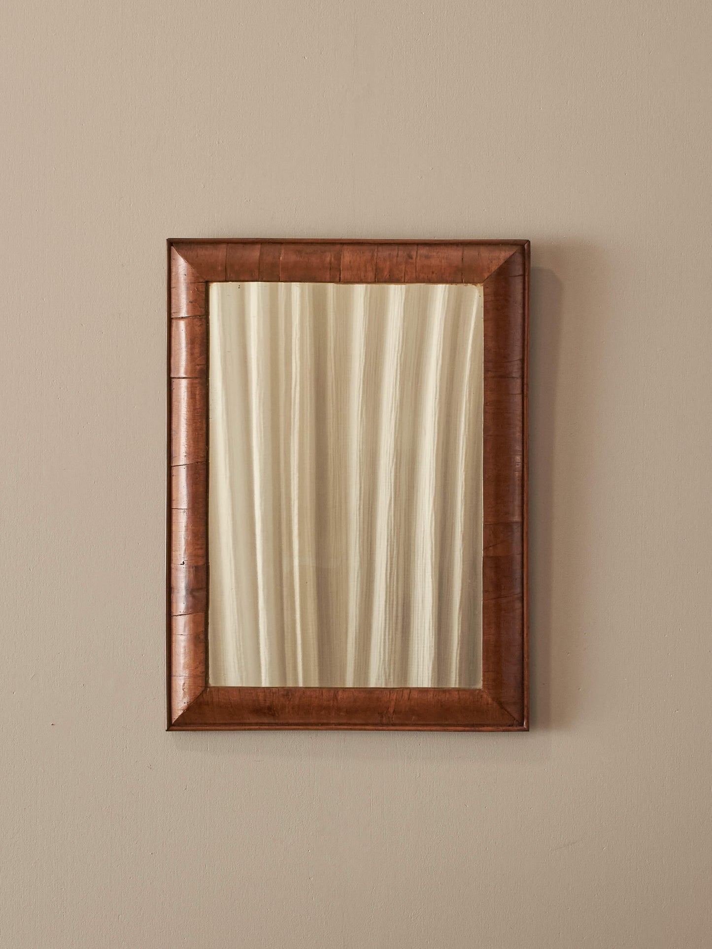 Antique walnut cushion mirror