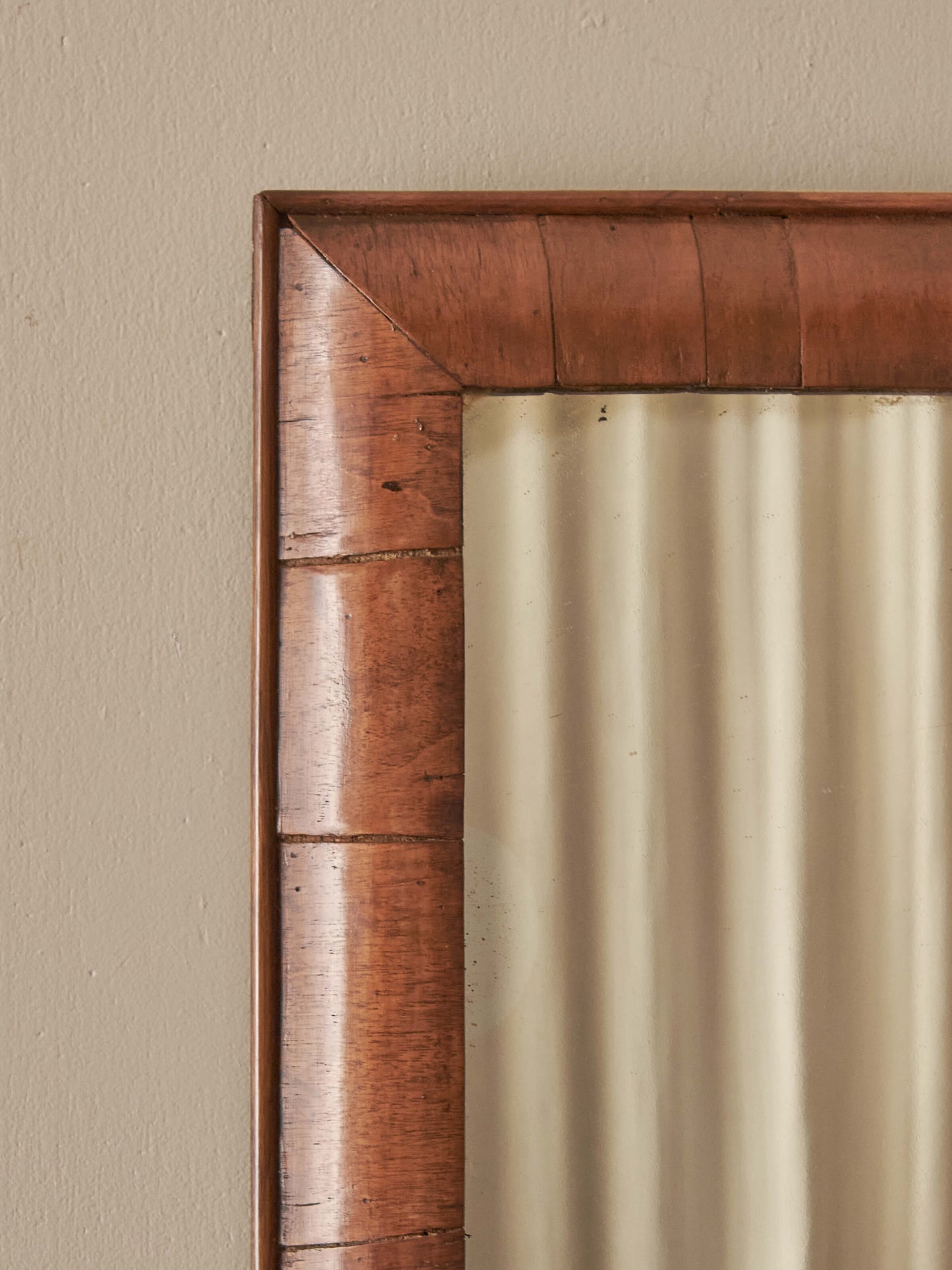 Antique walnut cushion mirror