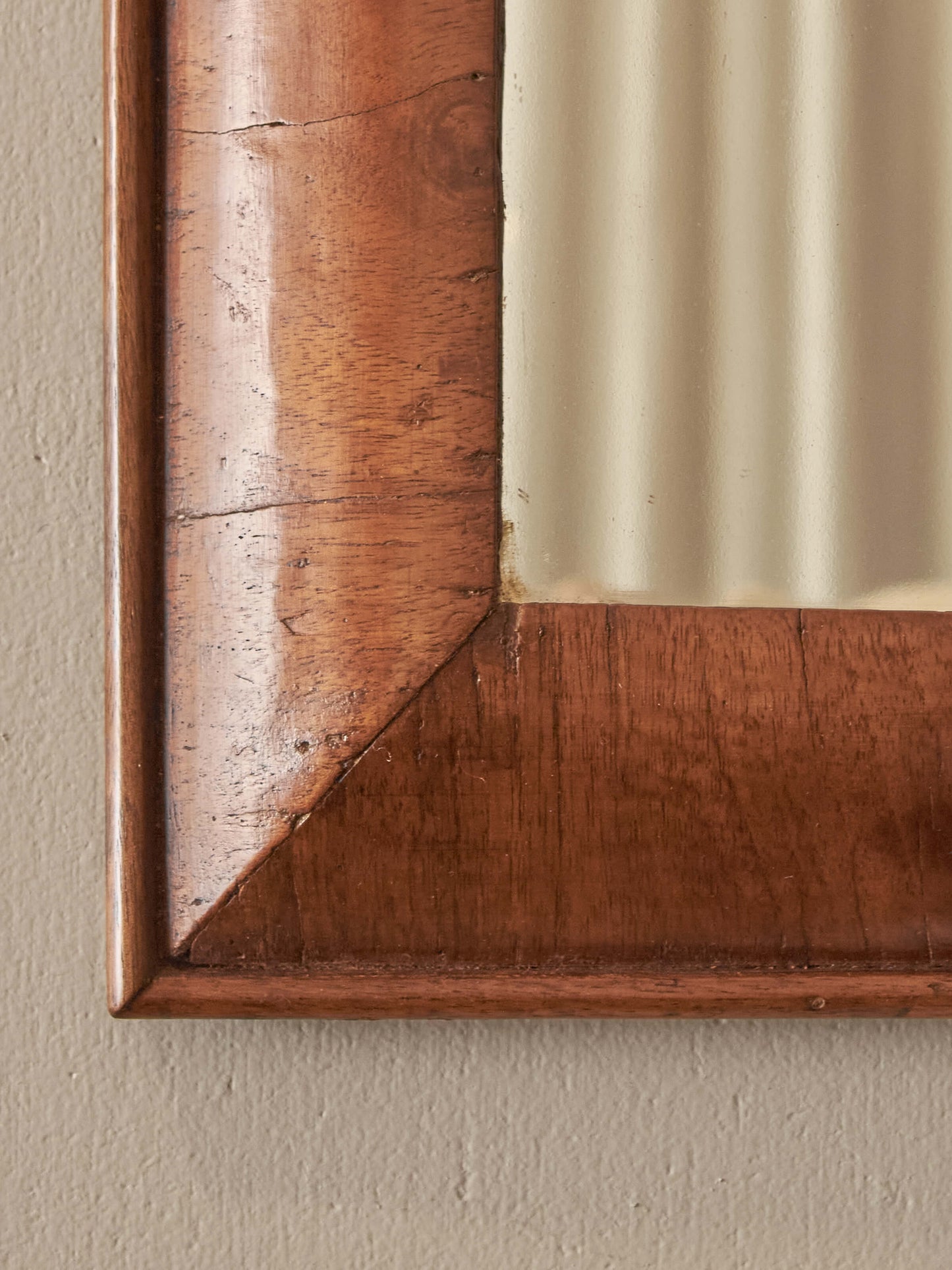 Antique walnut cushion mirror