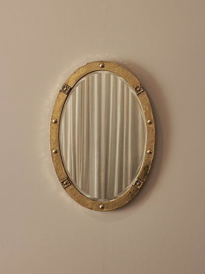 Arts and Crafts oval hammered brass mirror