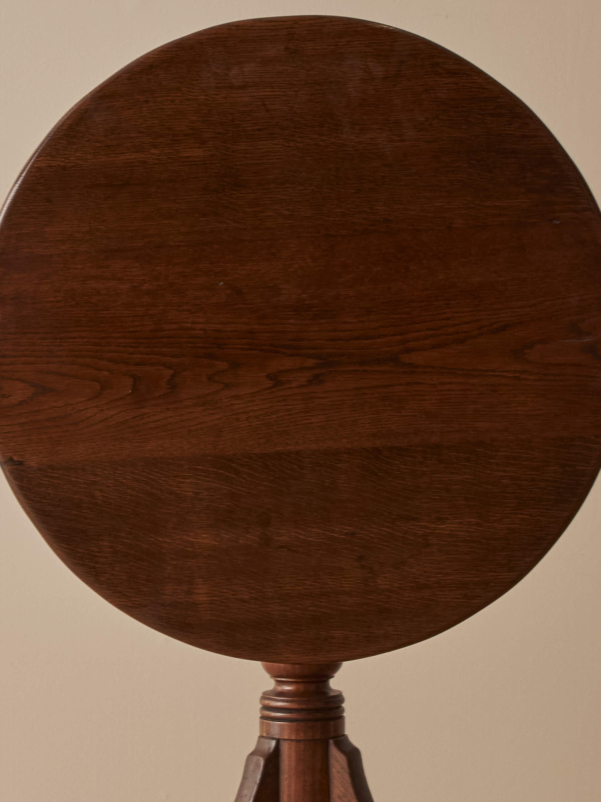 Antique circular oak tilt-top table
