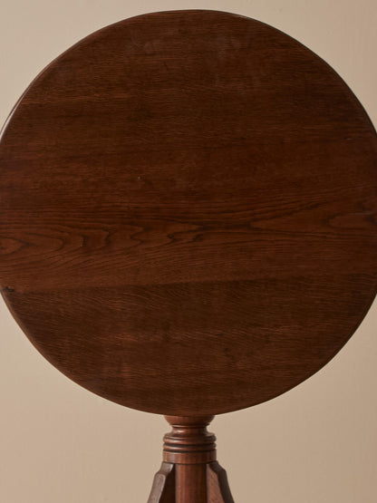 Antique circular oak tilt-top table