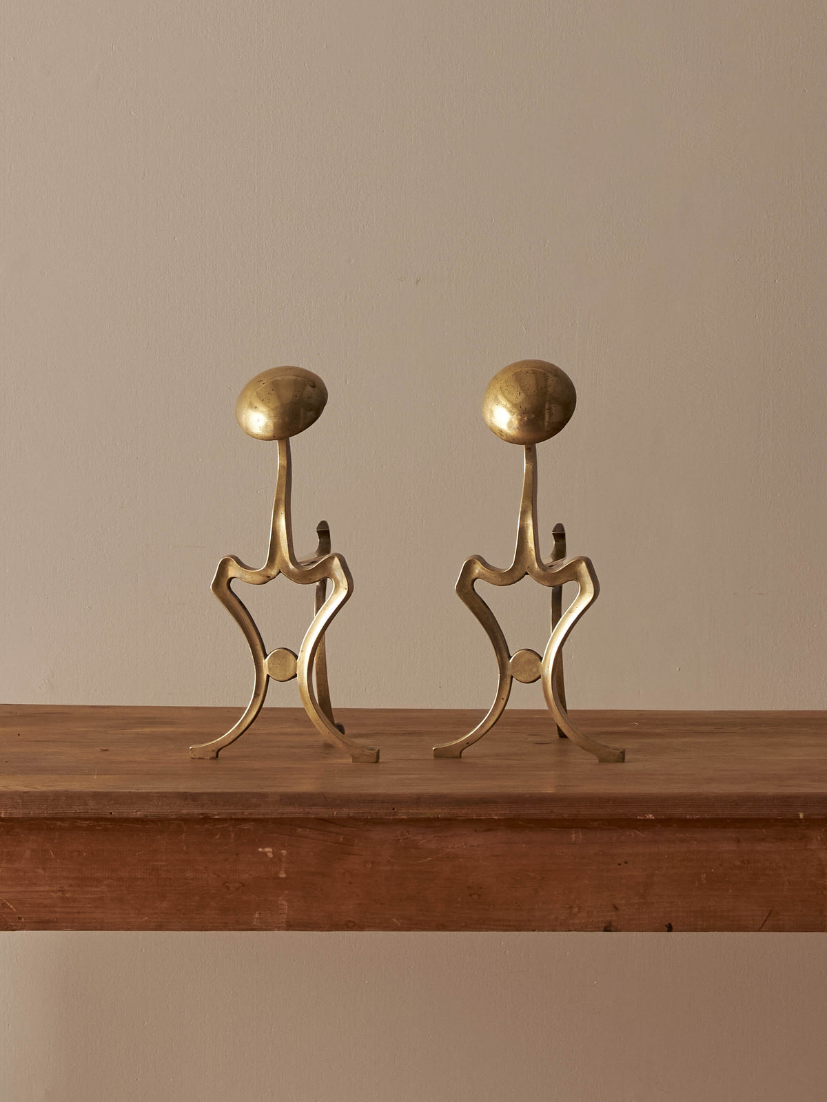 Pair of antique Art Nouveau brass fire dogs