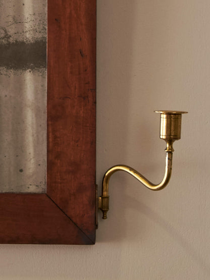 ON HOLD Antique walnut mirror flanked with brass candle sconces