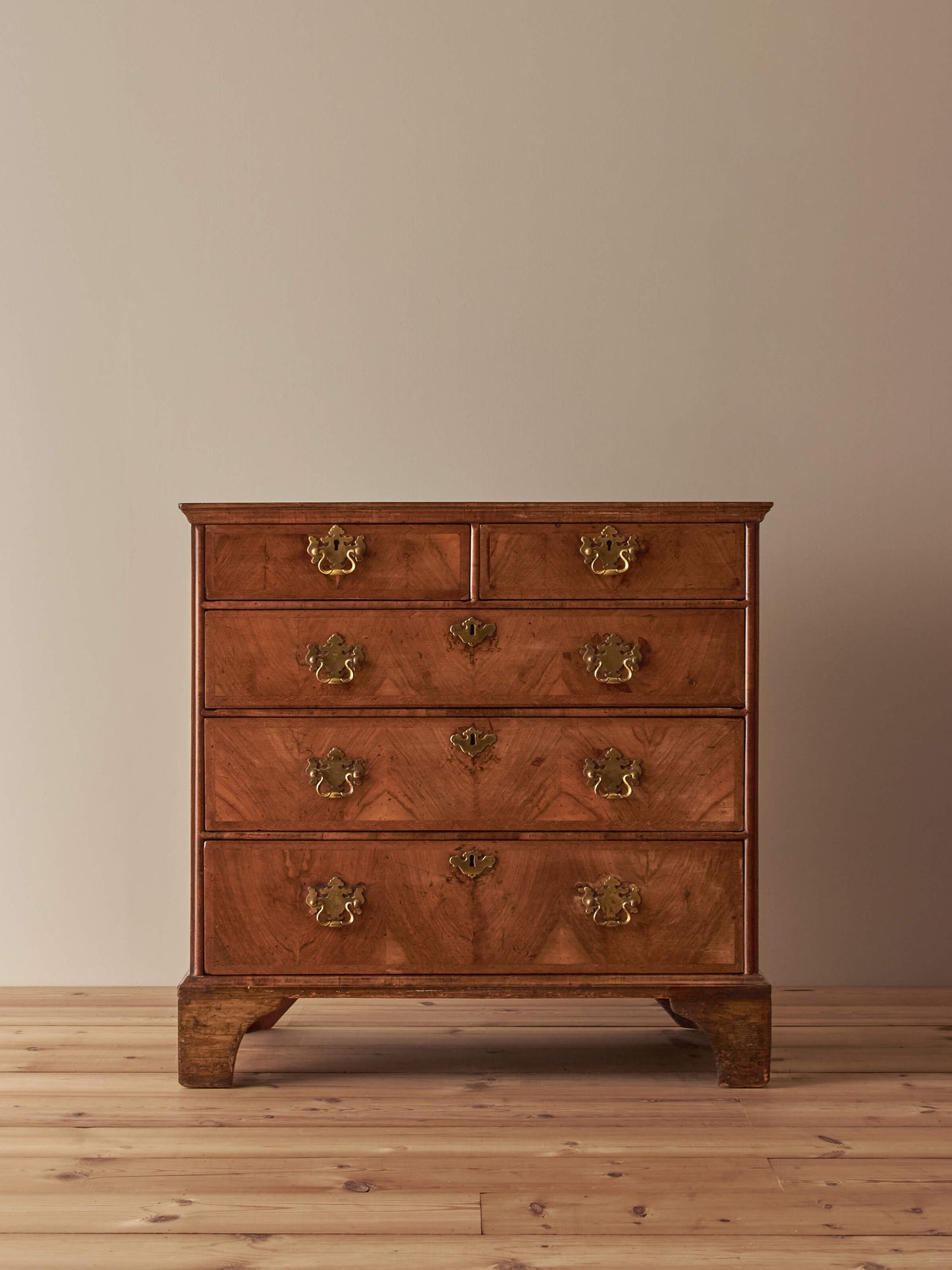 George II walnut crossbanded chest of drawers