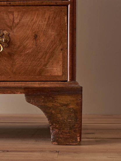 George II walnut crossbanded chest of drawers