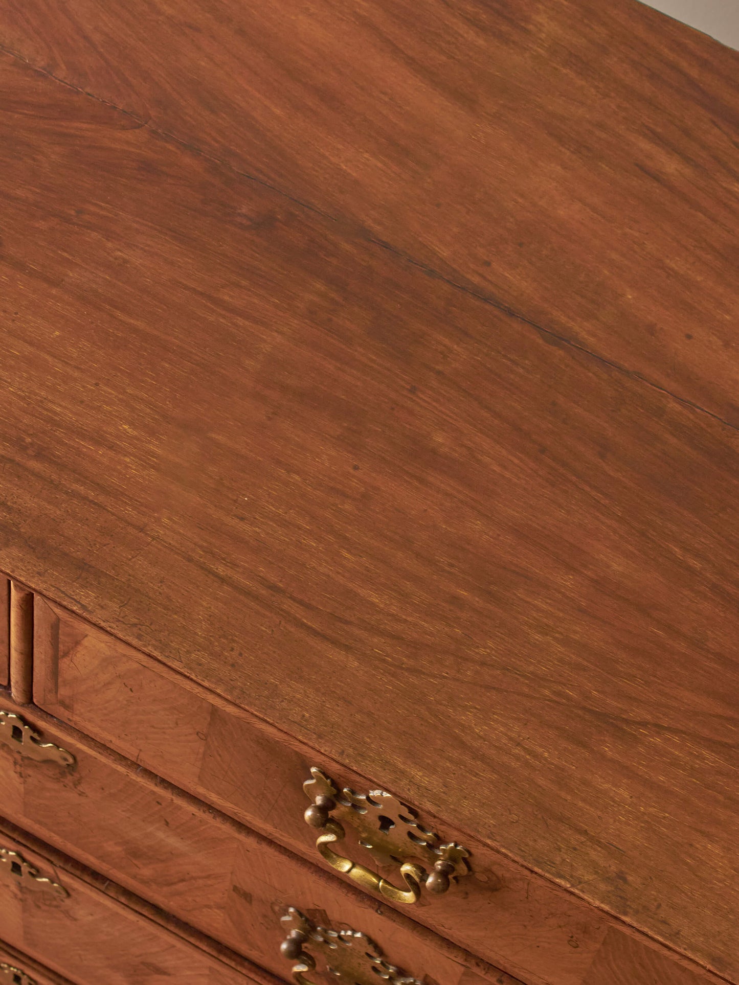 George II walnut crossbanded chest of drawers