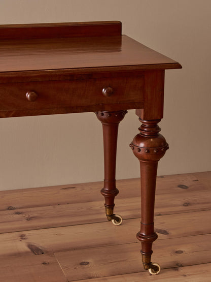 Victorian mahogany desk on castors