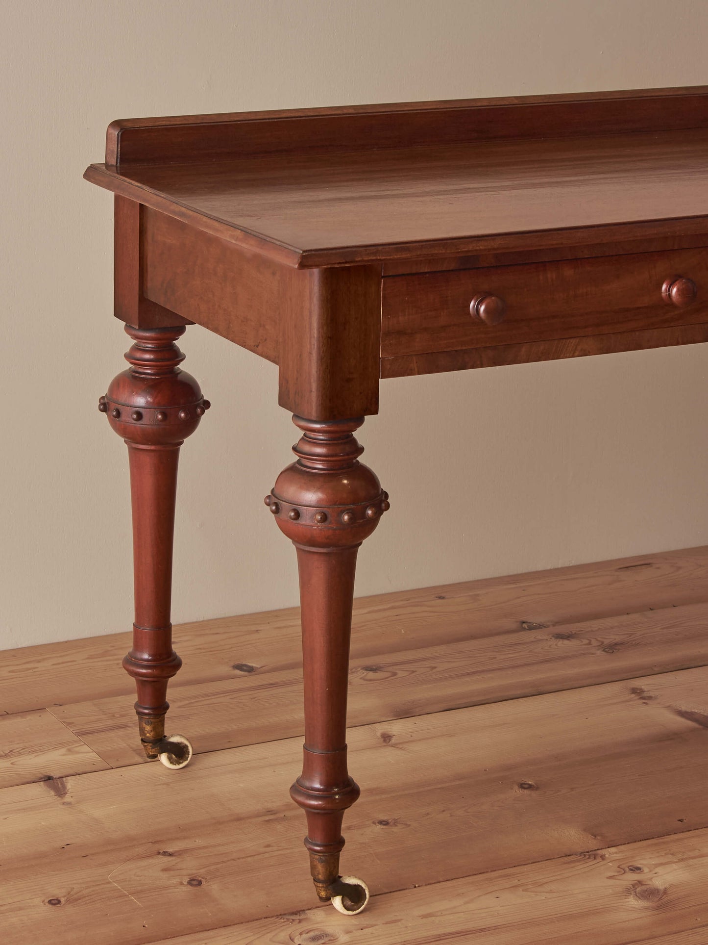 Victorian mahogany desk on castors