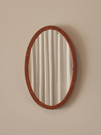 Antique oval walnut mirror