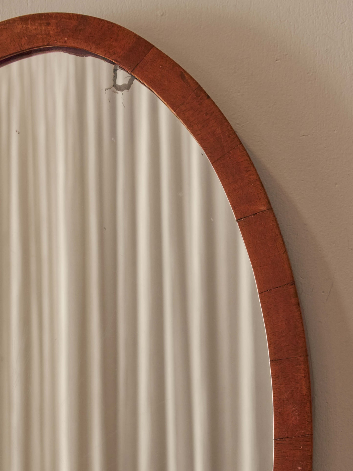 Antique oval walnut mirror