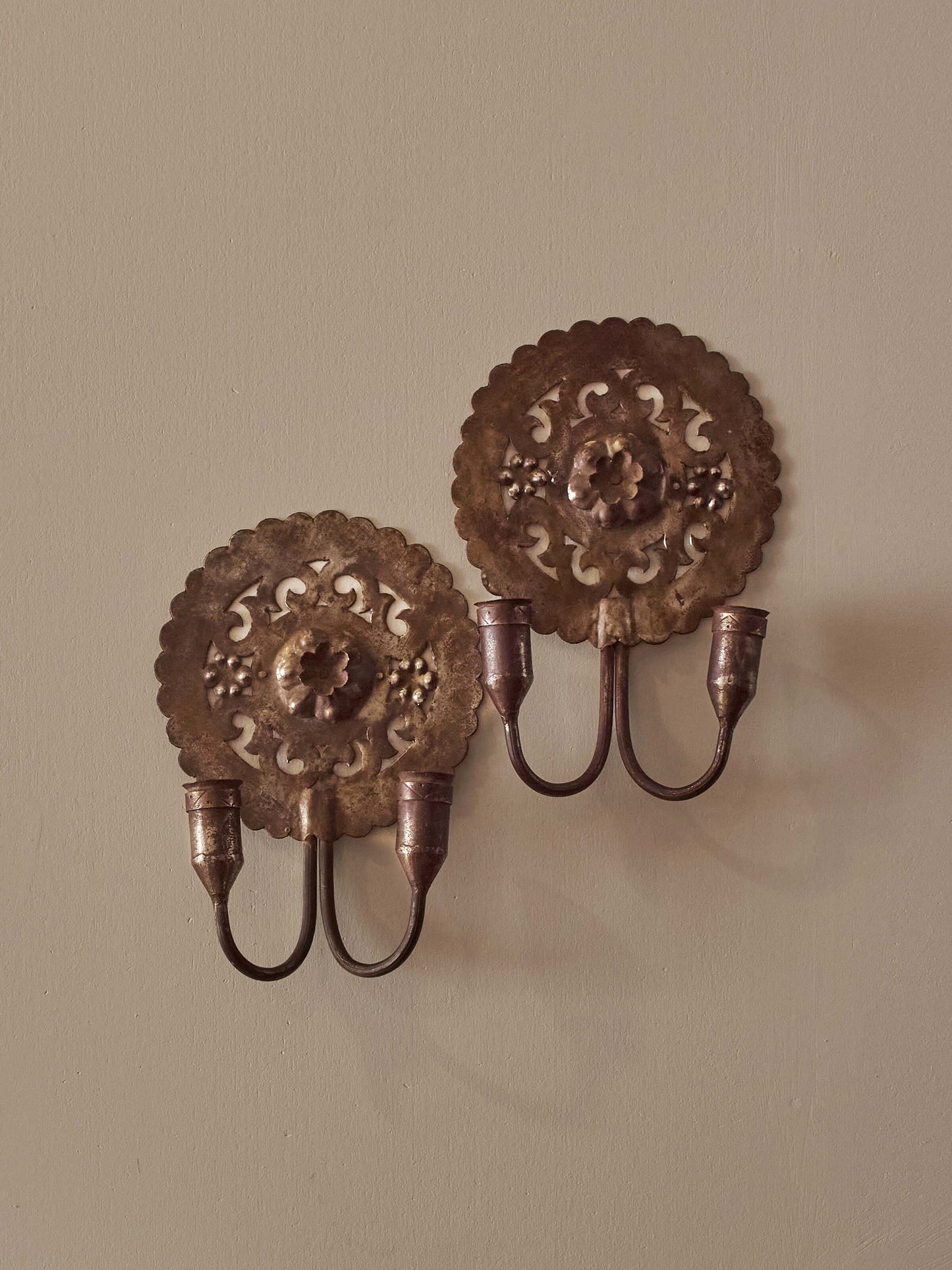 Pair of metal candle sconces