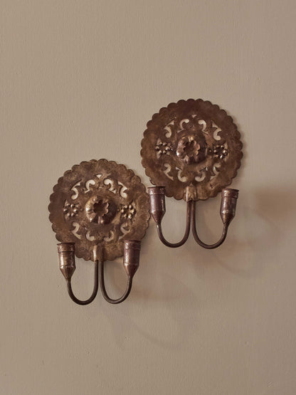 Pair of metal candle sconces