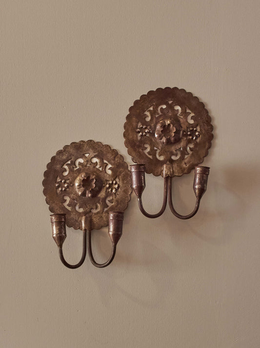Pair of metal candle sconces