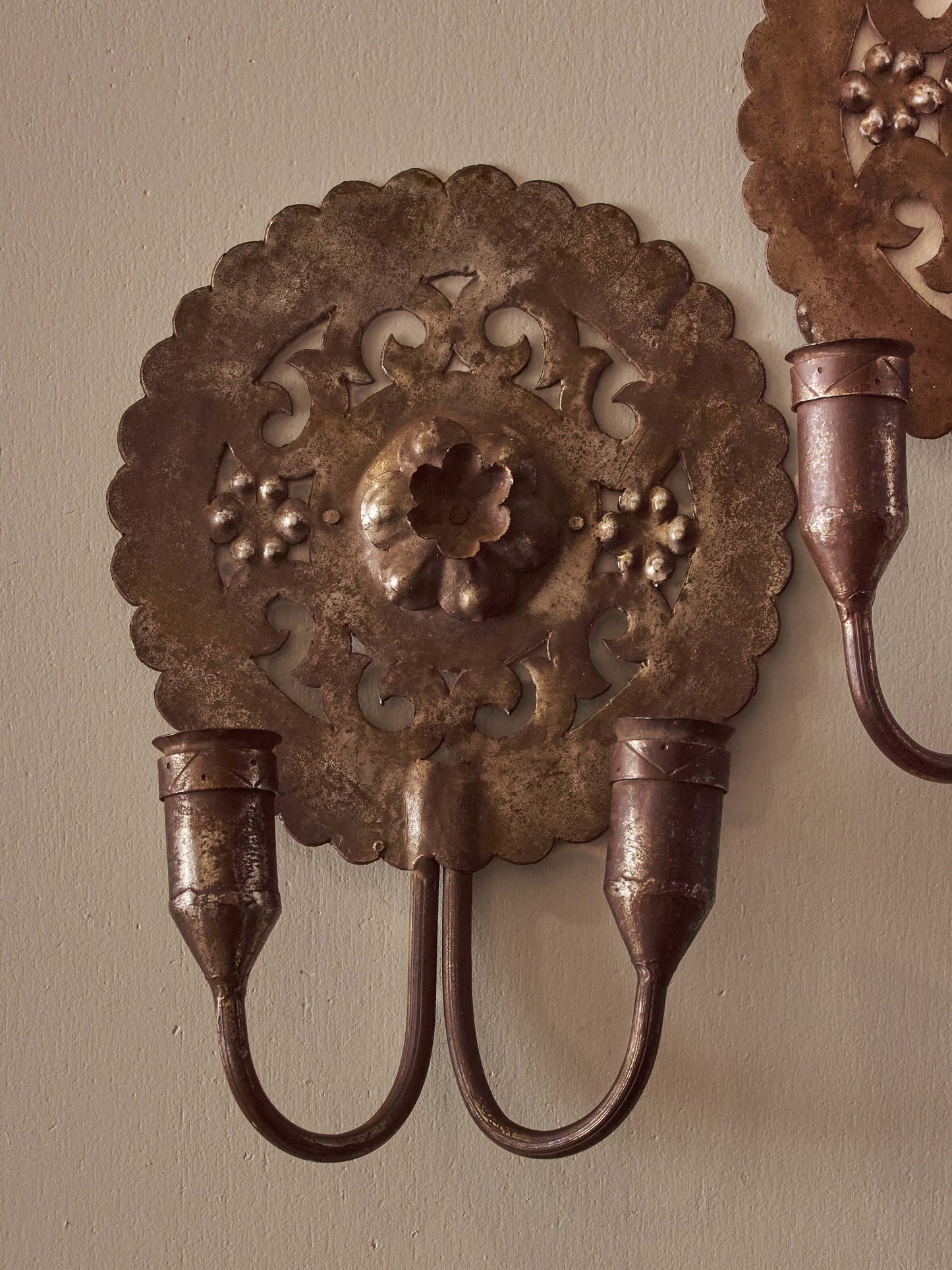 Pair of metal candle sconces