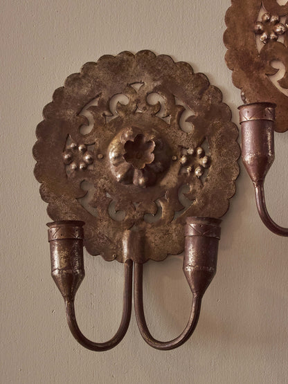 Pair of metal candle sconces