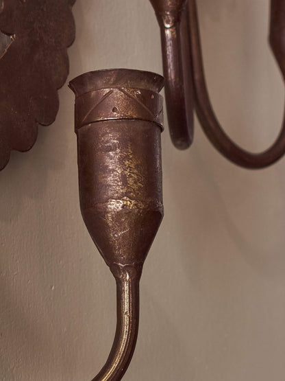 Pair of metal candle sconces