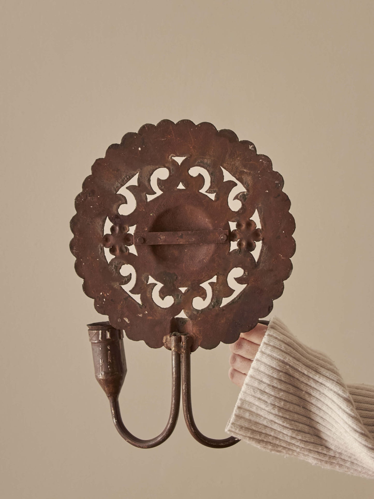 Pair of metal candle sconces