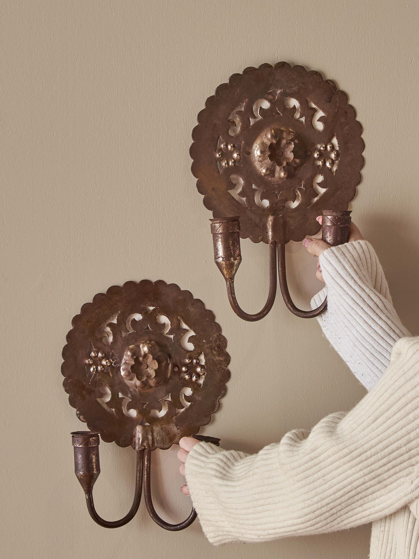 Pair of metal candle sconces
