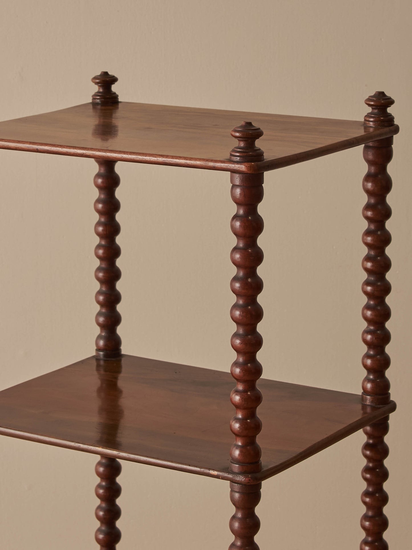 Victorian rosewood bobbin whatnot on castors
