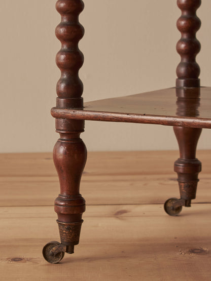 Victorian rosewood bobbin whatnot on castors