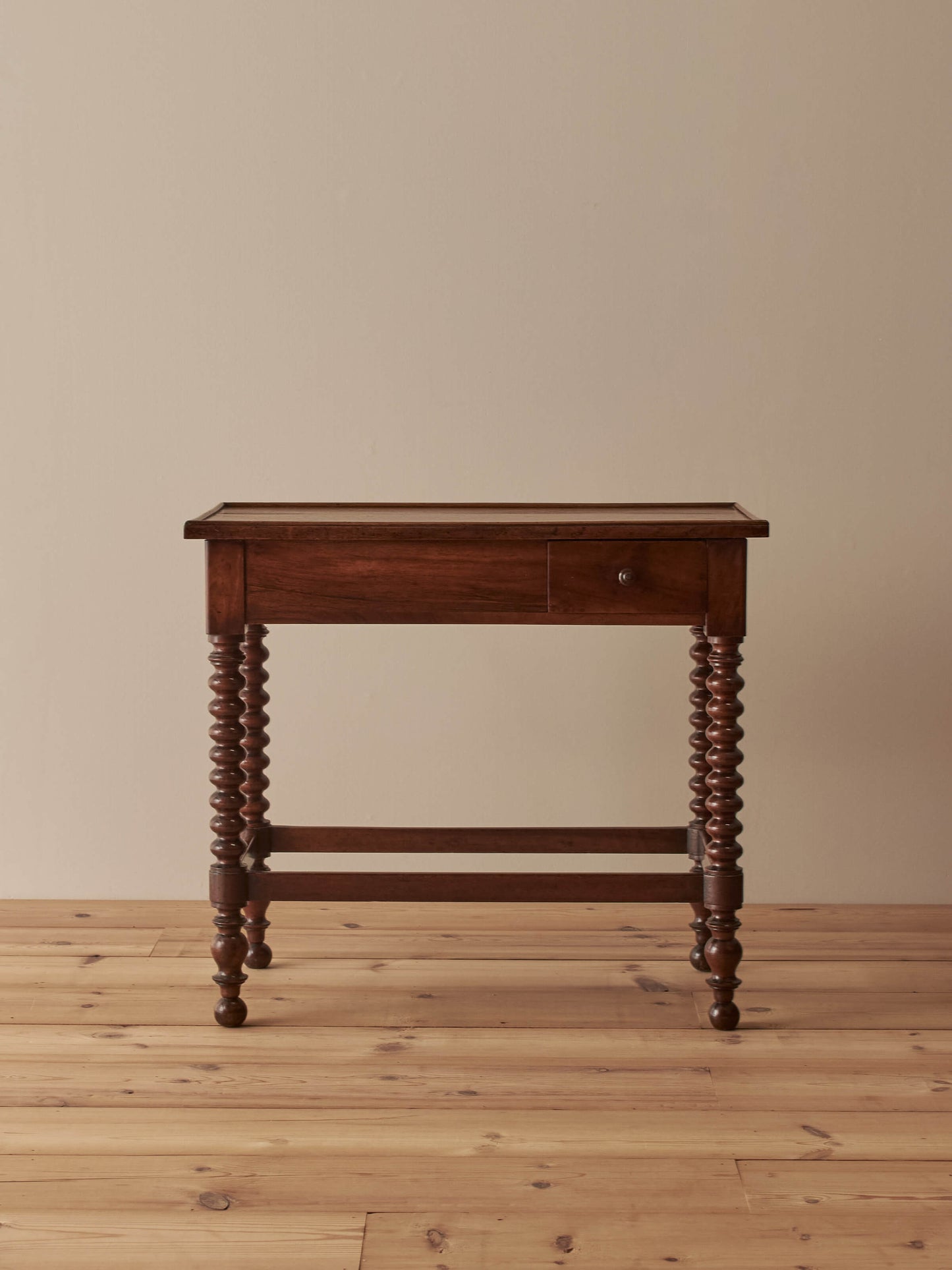 Antique French walnut and mahogany side table