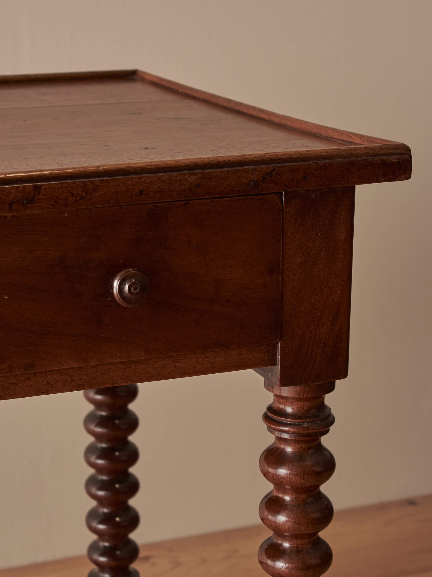 Antique French walnut and mahogany side table