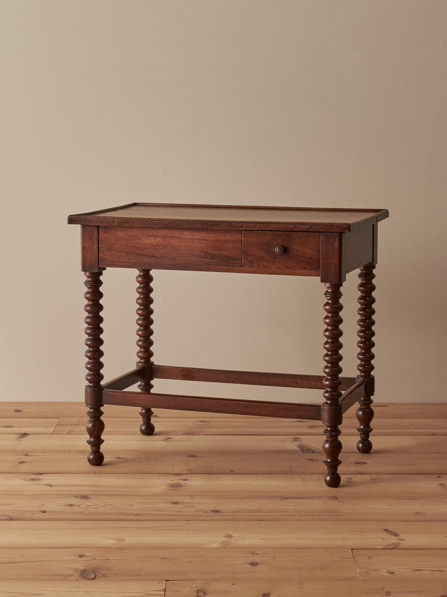 Antique French walnut and mahogany side table