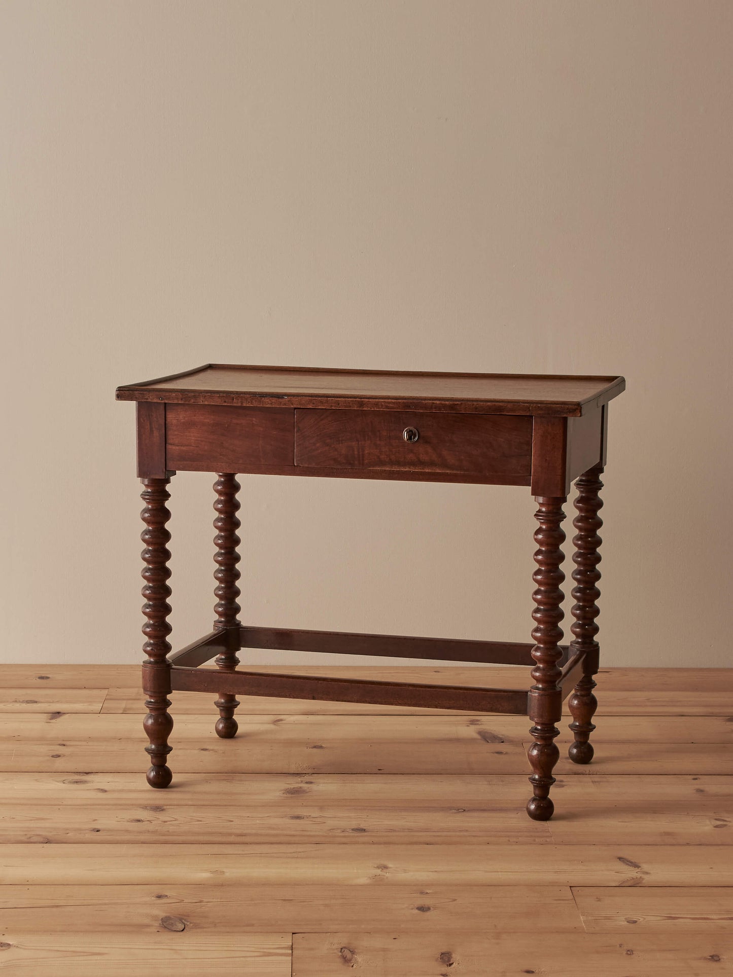 Antique French walnut and mahogany side table
