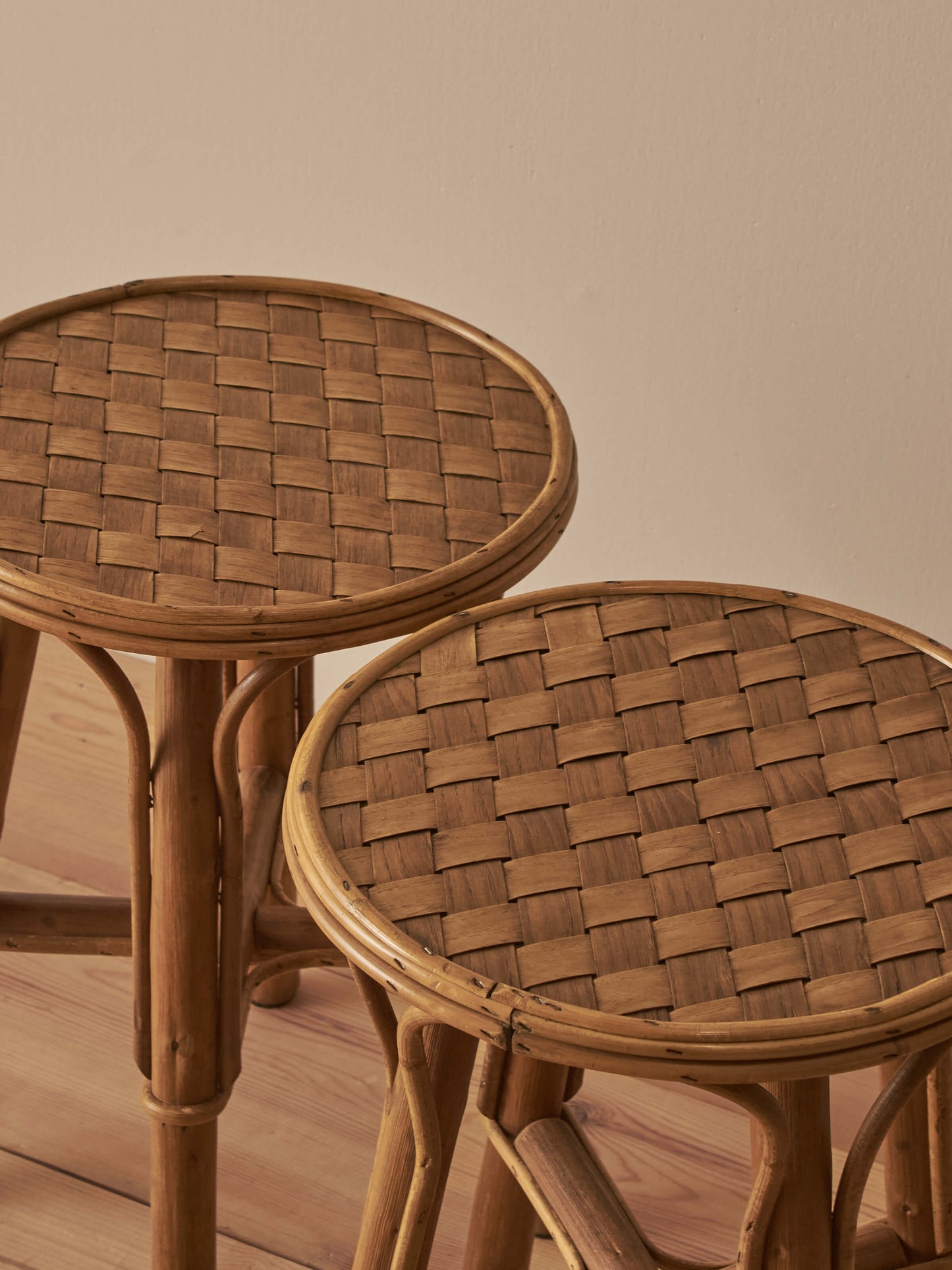 Pair of mid-century woven chestnut side tables