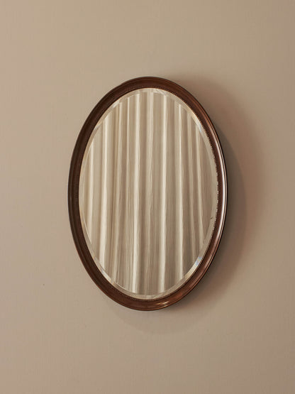 Edwardian oval mahogany mirror